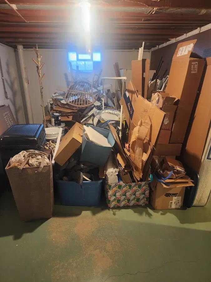 Roll-off dumpster container at job site for 2 Yard Dumpster Rental in North Shore